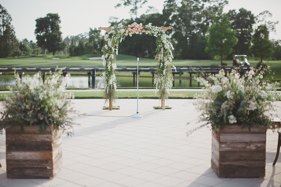 lush floral ceremony arch